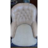 A 19th Century Armchair with Deep-Buttoned Back.