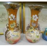 A Pair of Late 19th Early 20th Century Satsuma Earthenware Baluster Shaped Vases; decorated with