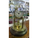 A Brass Anniversary Clock; with a Glass Dome.