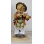 A Goebel Figure of a Boy Playing the Violin.