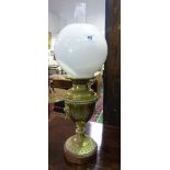 A 19th Century Brass Oil Lamp with milk glass shade.
