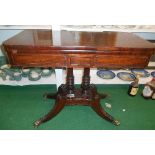 A Magnificent Georgian Mahogany D End Foldover Card Table; raised on a pair of shaped pillars with