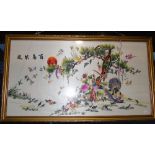 A Late 19th Century Oriental Embroidered Silk Panel; depicting exotic birds in a pine tree, framed