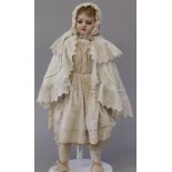 Mid 19th century poured wax doll with bl