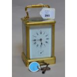 A brass cased repeat carriage clock. Hei
