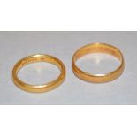 Two Hallmarked 22ct Gold wedding rings,