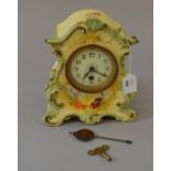 French ceramic-cased clock. With key and