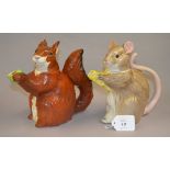 Two teapots in the form of a squirrel an