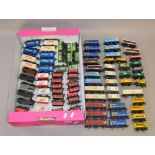OO Gauge. Unboxed wagons & box vans. 80+ Hornby, etc. Overall F/G Few missing coupling hooks.