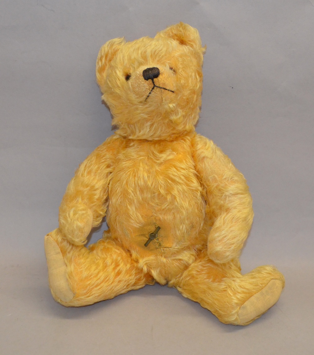 A Chad Valley Musical Teddybear together with a Chiltern bear.