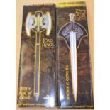 2 United Cutlery Brands Lord Of The Rings replicas: The Sword Of Boromir and Battle Axe Of Gimli.