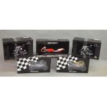 5 Minichamps motorcycle models including Triumph and Honda examples.