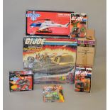 Three Hasbro G.I Joe figures carded, together with Three Robocop boxed figures and vehicle.