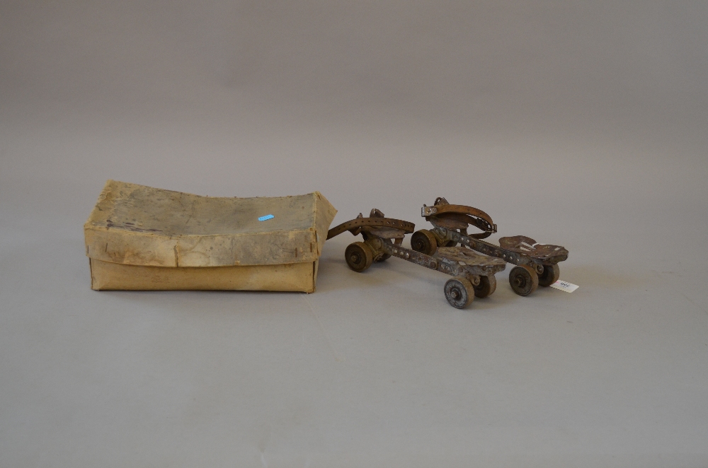 A pair of Victorian Roller Skates, in box (P).