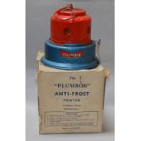 A vintage Plumbob Anti-Frost Heater in red and blue.