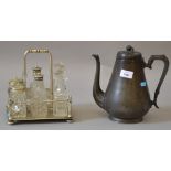 A cruet set including with 6 cut glass containers,