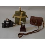 A pair of WWII German binoculars/ field glasses together with a water canteen and a german eagle