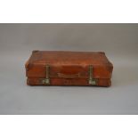 A vintage GWR Revelation travel suitcase in brown.