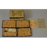 1924 Chad Valley Mah-Jongg game. Contains Ivory pieces and wooden tiles.