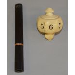 An antique ivory octagonal spinning top with engraved numbering 1-8. Missing handle.