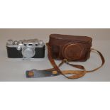 Leica D.R.P Ernst Leitz Wetzlar IIIc camera No. 420468 and red scale Elmar lens in leather case.