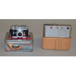 2 Leica cameras: M3 Minox in tin with accessories together with a Leica D-Lux in leather case (2)