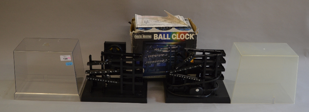 2 Ball clocks: Electric Time Machine and House Martin Ball Clock