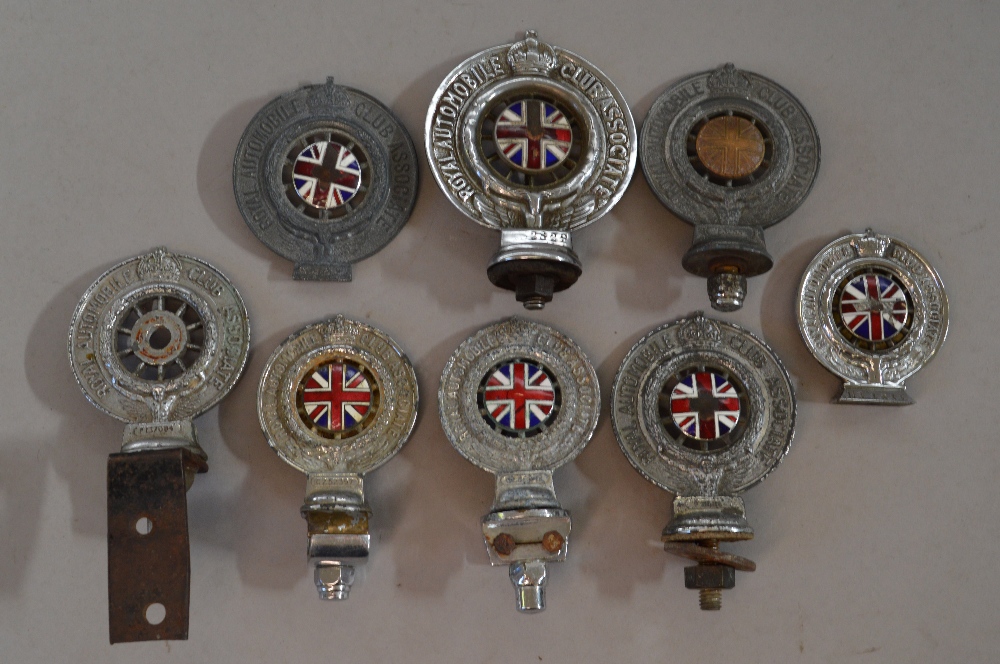 8 Pre War RAC badges and car mascots, most with Union Jack enamel centre.