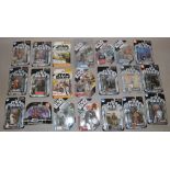 Quantity of assorted Star Wars carded figures.