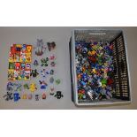 Good quantity of assorted Transformers toys: Hasbro Bot Shots; Takara Animated Microbots; Tiny Tins;