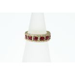 A ruby and diamond set eternity ring, approx total diamond weight 0.