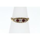 A Ruby and Diamond five stone ring,