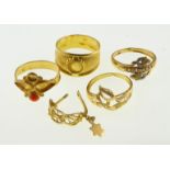 POLICE > A quantity of Asian style jewellery to include four rings and a single earring,