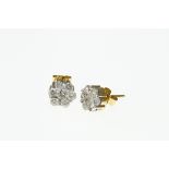 A pair of 18ct H/m diamond set daisy cluster earrings, approx total diamond weight 0.
