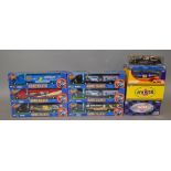 18 x Action diecast racing models, mainly Nascar: 12 x 1:24 scale cars; six trailer rigs.