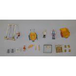 Britains. Assorted figures including delivery carts, scarce acrobat etc.