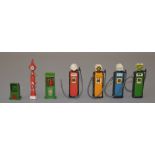 Britains petrol pumps: Shell; BP; Dominion; Benzole National Mixture; three other accessories.