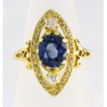 A sapphire and diamond marquise shaped cluster ring stamped 18ct, approx total diamond weight 0.