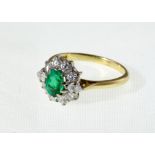 An 18ct H/M Emerald & Diamond cluster ring, total diamond weight approx 1.00ct, approx 3.