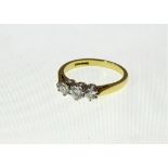 An 18ct Diamond three stone ring totalling approx 0.55ct, modern 18ct H/M, approx 3.