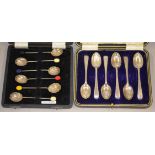 Two cased sets of 6 silver tea/coffee spoons, totalling approx 120g,