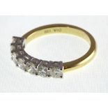 An 18ct H/M seven stone diamond half eternity ring, approx diamond weight 1.