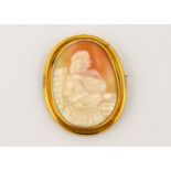 A Victorian shell cameo brooch in an oval gilt metal mount,