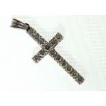 An 18ct white gold H/M diamond set cross, approx total diamond weight 0.