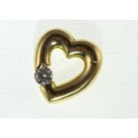 An 18ct H/M diamond set heart pendant, approx diamond weight 0.25ct, approx 3.