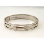 A silver MONTBLANC hinged bangle (genuine) approx weight 75g,