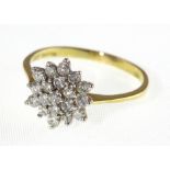 An 18ct H/M diamond cluster ring, approx total diamond weight 0.