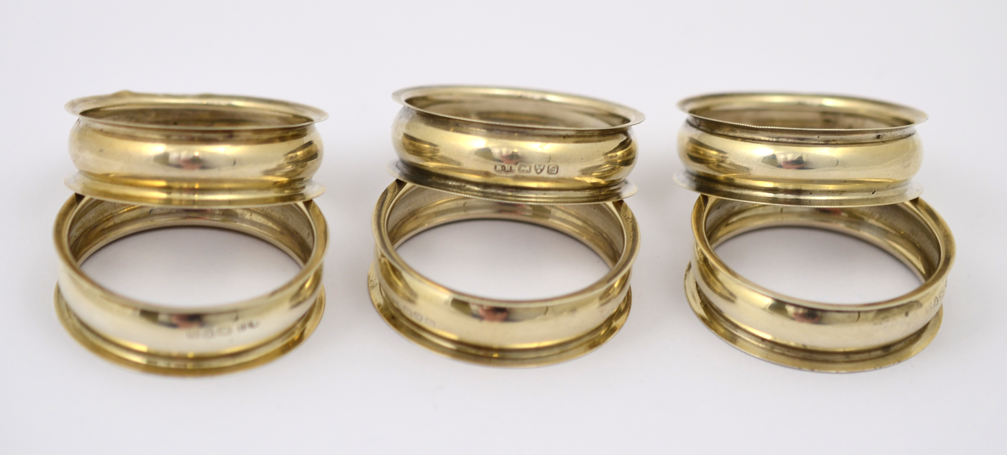 A set of six silver napkin rings, H/M Chester 1904,