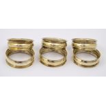 A set of six silver napkin rings, H/M Chester 1904,