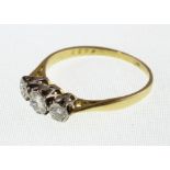 A three stone diamond ring, the brilliant cut stones totalling approx 0.30ct, 2.